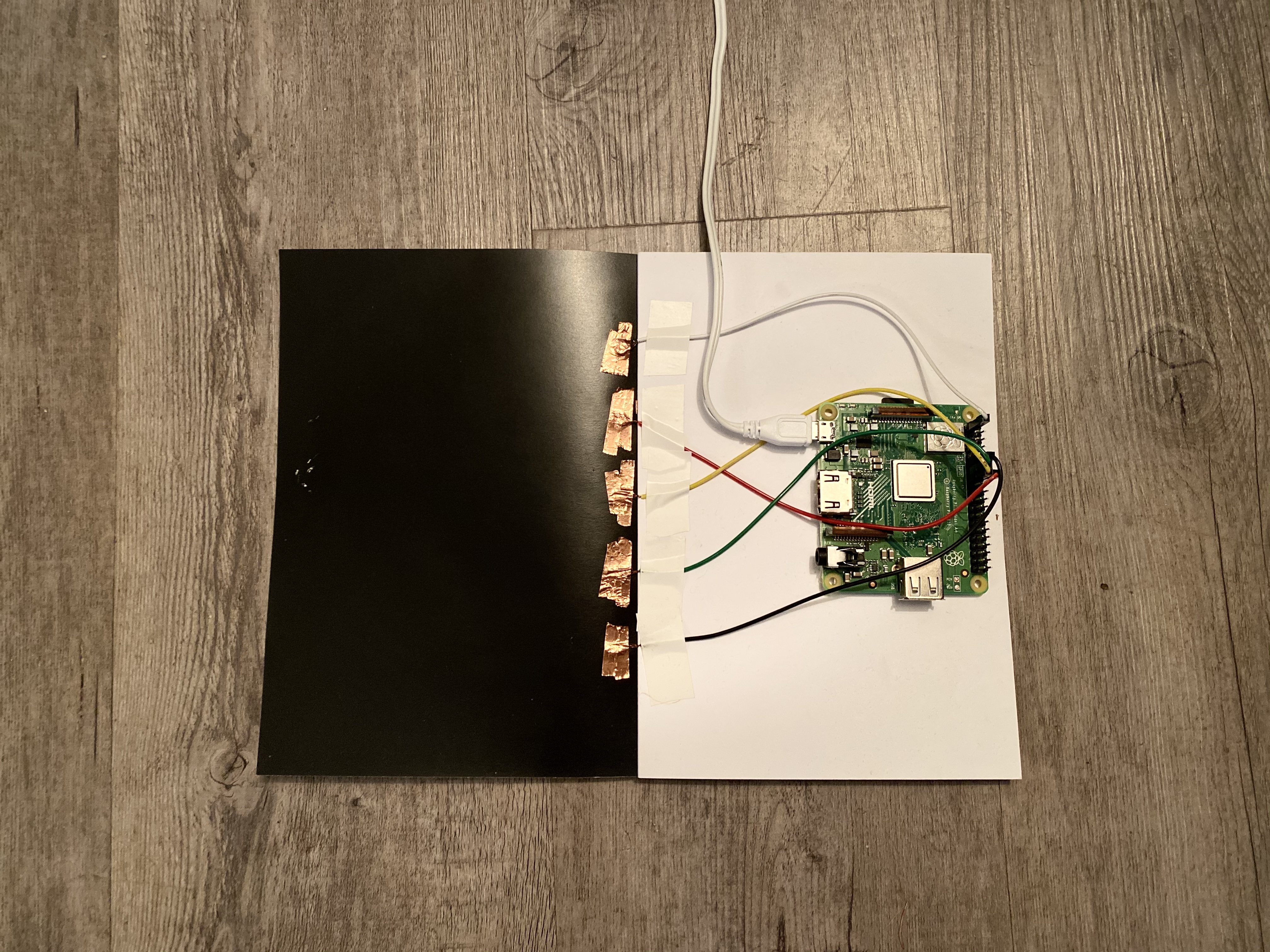 Hybrid book prototype back view showing circuit connections